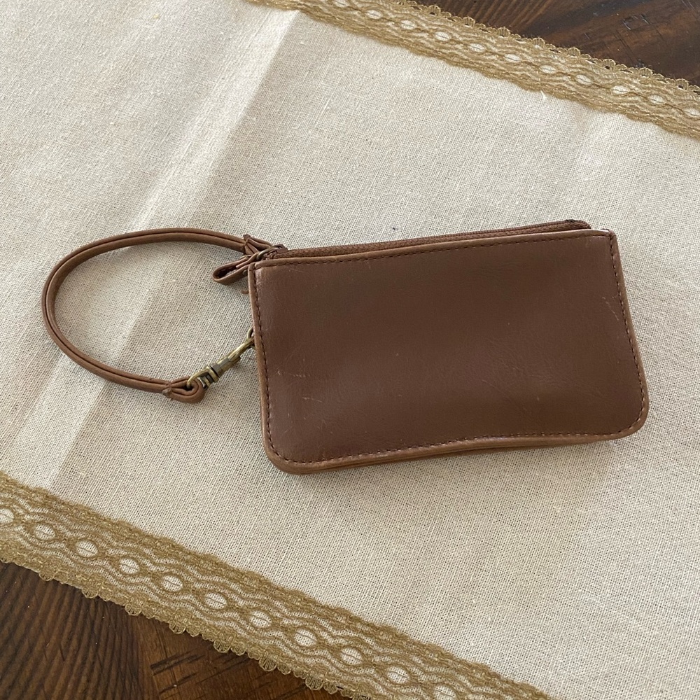Brown leather wristlet with double zipper compartments